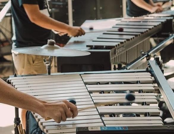 A percussionist performing on a marimba